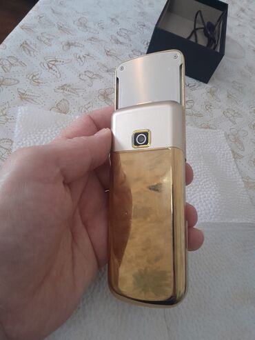 Digər mobil telefonlar: Qızılı korpuslu sürüşdürmə mexanizmalı düyməli mobil telefon — 4