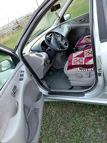машина на час: Nissan Almera Tino: 2002 г., 2 л, Вариатор, Бензин — 9