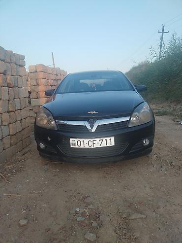 Opel: Opel Astra sedan - Kuzov: 4 qapılı sedan, qara rəng - Salon: parça — 6