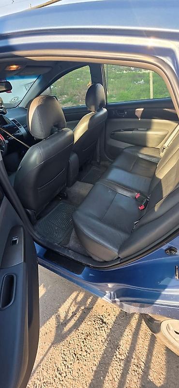prius 20 spoiler: Toyota Prius (2-ci nəsil) hibrid hetçbek - Rəng: mavi - Kuzov: 5 — 7