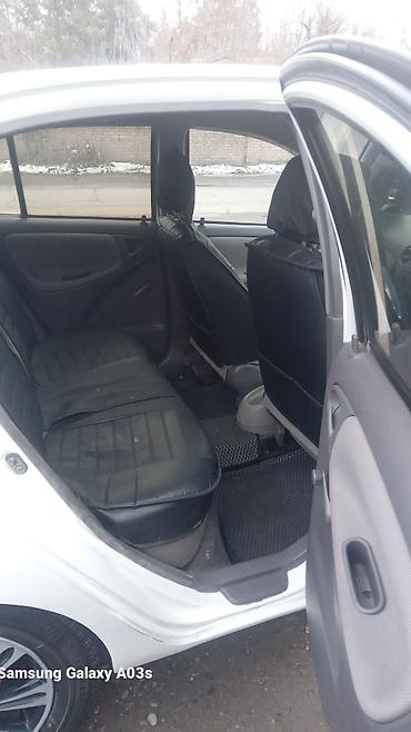 voxy noah: Toyota Echo: 2001 г., 1.5 л, Автомат, Бензин, Седан — 8