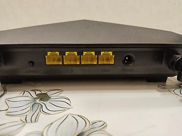internet mini modem: İki diapazonlu Wi‑Fi router Xüsusiyyətlər: - 4 ədəd xarici antena – — 1