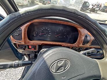 hyundai пикап: Hyundai Porter — малотоннажный бортовой грузовик, синий цвет кузова — 3
