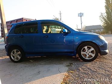 subaru impreza 2002: Mazda Demio: 2003 г., 1.5 л, Автомат, Газ, Хэтчбэк — 2