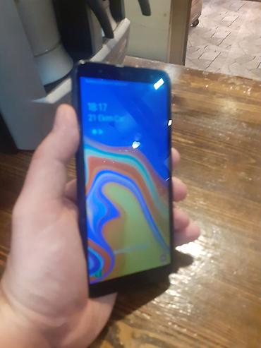 samsung galaxy j6 plus: Samsung Galaxy J6 Plus, 32 GB, rəng - Qara, Barmaq izi, Face ID — 2