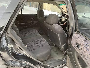 Mazda: Mazda 323: 2000 г., 1.8 л, Механика, Бензин, Универсал — 8