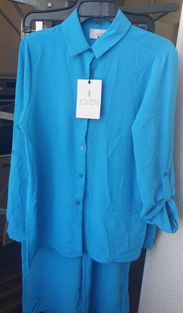 бренд одежды: S (EU 36), M (EU 38), цвет - Голубой