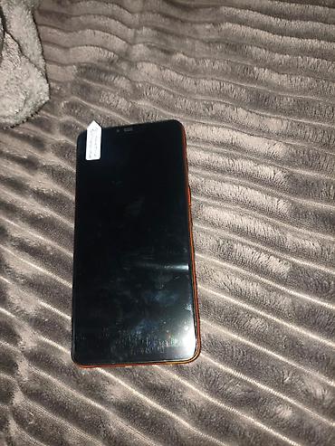 samsung om6: Смартфон с большим экраном и тремя камерами, оранжевый корпус 1 — 2