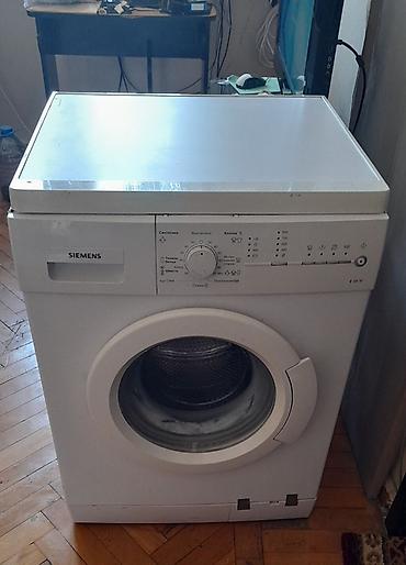 erikson 1018: Siemens E 10-18 modelinin ağ rəngli, ön yükləməli paltaryuyanı. Bu — 5