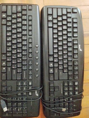 kalonka gəncə: İki ədəd qara rəngli Genius klaviaturası. Hər iki klaviatura USB