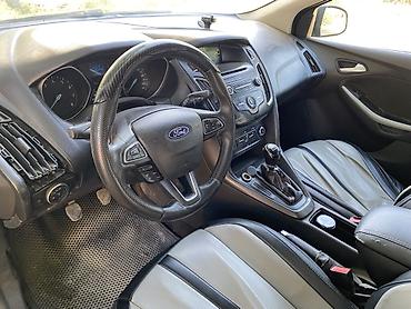 Продажа авто: Ford Focus: 2015 г., 1.6 л, Механика, Бензин, Универсал — 7