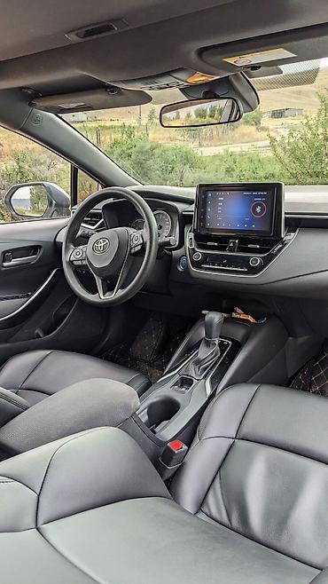 byd e6: Toyota Corolla: 2023 г., 1.8 л, Вариатор, Гибрид, Седан — 8