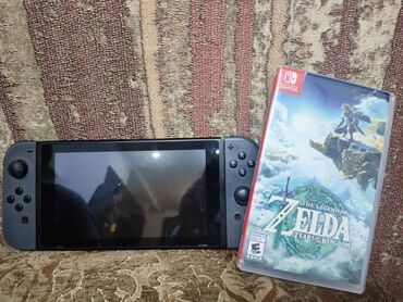 cubot note 50 цена в бишкеке: Игровая консоль Nintendo Switch, выполненная в черном цвете