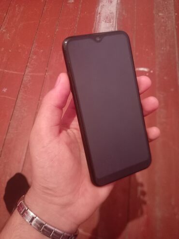 Samsung Galaxy A01, 16 ГБ, цвет - Черный, Сенсорный, Отпечаток пальца, Беспроводная зарядка