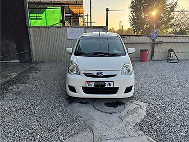 бу болон: Daihatsu Cuore: 2009 г., 1 л, Автомат, Бензин, Хэтчбэк — 1