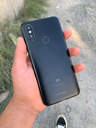 honor 200 lite qiyməti: Xiaomi Mi A2, 128 GB, rəng - Qara, 
 Barmaq izi, İki sim kartlı — 1