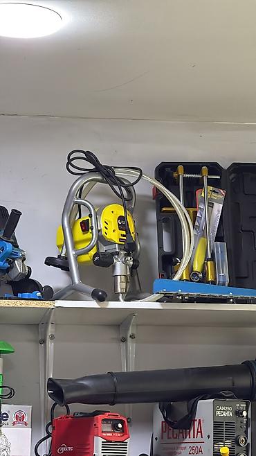 Sənaye tipli elektrikli boya püskürdücü (airless paint sprayer)