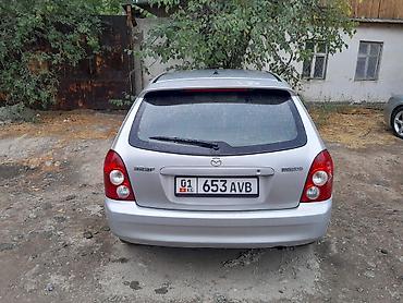 2 8: Mazda 323: 2003 г., 1.6 л, Механика, Бензин, Седан — 2