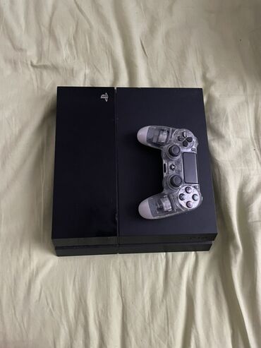 сони 4: Игровая приставка Sony PlayStation 4 черного цвета, предназначенная