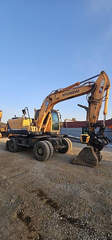 Экскаваторы: Экскаватор, Hyundai, 2013 г., Колесный — 4