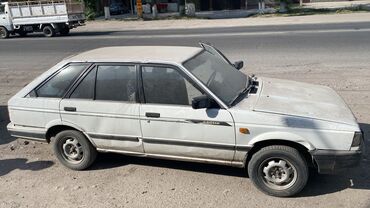 автомобиль ниссан: Nissan Sunny: 1988 г., 1.6 л, Механика, Бензин, Седан
