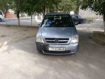 фольксваген поло новый кузов комплектации: Opel Meriva, gümüşü rəngli, 5 qapılı kompakt minivan. Xüsusiyyətlər