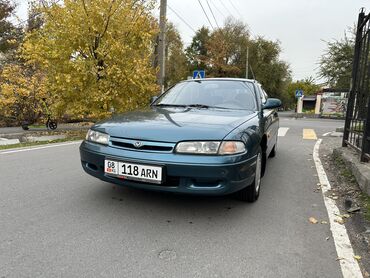 мазда 323 1 8: Mazda Cronos: 1993 г., 2 л, Механика, Бензин, Хетчбек