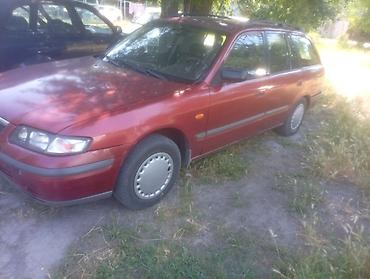 belarus 892 2: Mazda 626: 1999 г., 1.8 л, Механика, Бензин, Универсал — 4