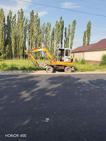 bud e9: Экскаватор, 1998 г., Колесный — 4