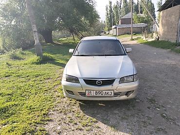 армянский учет: Mazda 626: 1999 г., 1.8 л, Механика, Бензин, Седан — 4