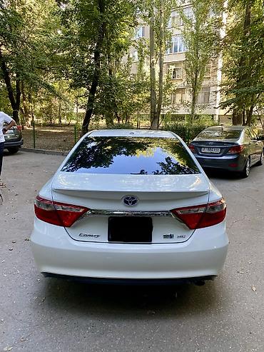 byd e2 2024: Toyota Camry: 2016 г., 2.5 л, Автомат, Гибрид, Седан — 4