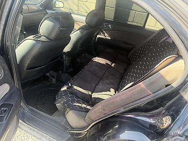 механическая: Nissan Maxima: 1996 г., 2 л, Механика, Бензин, Седан — 6