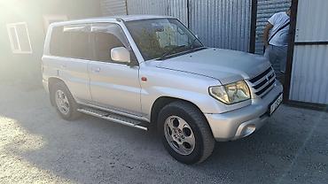 моно 1 6: Mitsubishi Pajero iO: 2003 г., 2 л, Автомат, Бензин, Внедорожник — 2