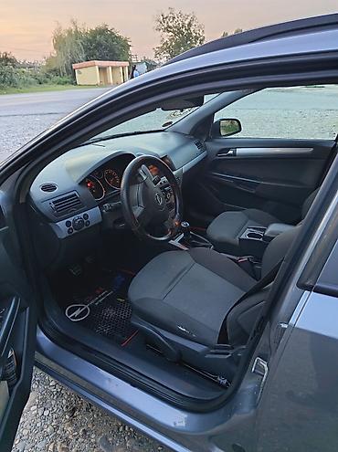 vaz 2107 2010: Opel Astra: 1.4 l | 2005 il Universal — 2