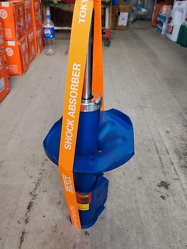 Амортизатор стойка передняя SR Genuine Parts (TOK — Shock Absorber) -