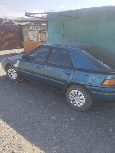 кузов мазда 323: Автомобиль Mazda 323F в кузове хэтчбек с пятью дверями, выполненный в