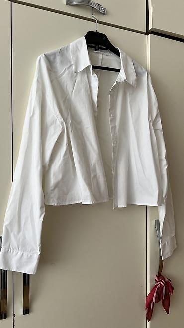 Ziyafət donları: - Məhsul: Oversize T‑shirt - Brend/Qrafika: “NEW ERA” mövzulu çap; ön — 7