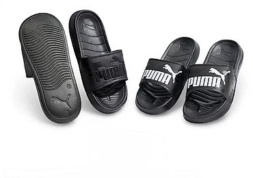 planika kucne papuce: PUMA unisex papuče – klasične “slide” sandale - Brend: PUMA - Model — 1