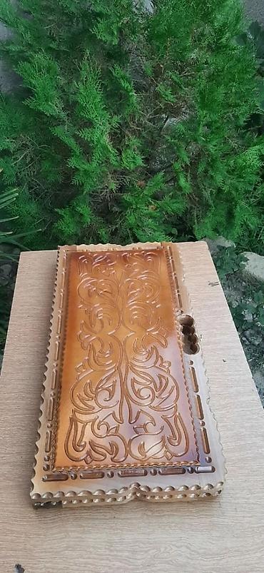 Nərdlər: Əl işi olan bu taxta nərd dəsti özünəməxsus oyma naxışları ilə — 23