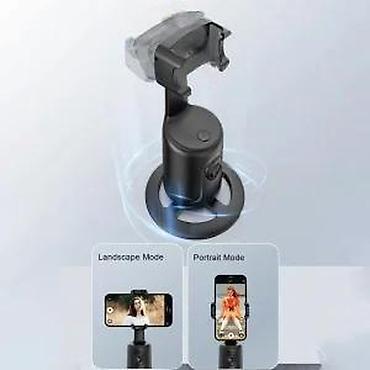 Stoni držači za telefone: Rotacioni stoni držač sa inteligentnim prepoznavanjem lica. Opis — 1