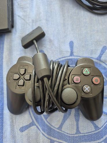 PS2 & PS1 (Sony PlayStation 2 & 1): Sony PlayStation 2 Slim komplekti Paketə daxildir: - PS2 Slim konsolu — 7