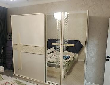 Dolab satılır. - Model: sürgülü qapılı dolab - Rəng: krem/çəhrayı-ağ