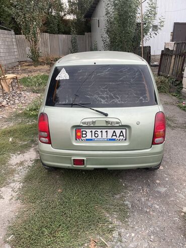 российские машины: Daihatsu Cuore: 2000 г., 1 л, Автомат, Бензин, Купе