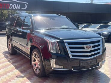 перфорация тормозных дисков: Черный внедорожник Cadillac Escalade (европеец) с хромированной