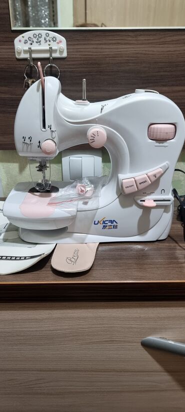 многофункциональная швейная машинка: Швейная машина Автомат