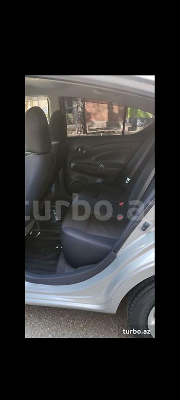 tesla model s: Nissan Sunny: 1.2 l | 2012 il Sedan — 10