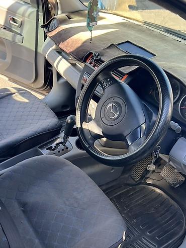 cx 9: Mazda Demio: 2002 г., 1.5 л, Автомат, Бензин, Хэтчбэк — 10