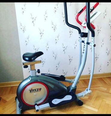 Музыкальные инструменты: TideTop markalı elliptik trenajor. Oturacaqlı və ayaq üçün