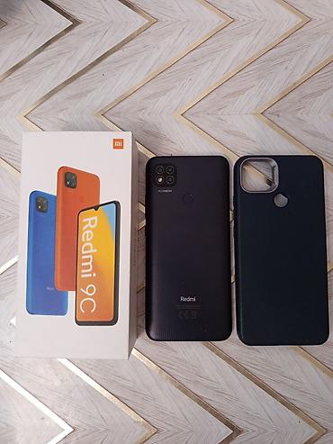 nokia magic max pro: Redmi 9C, 128 GB, rəng - Qara, Zəmanət, Barmaq izi, Simsiz şarj — 2