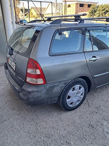 coroll: Toyota Corolla: 2003 г., Механика, Бензин, Универсал — 5